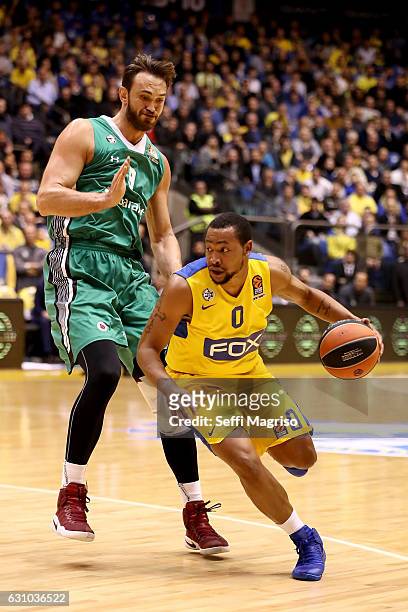Andrew Goudelock, #0 of Maccabi Fox Tel Aviv competes with Semih Erden, #9 of Darussafaka Dogus Istanbul during the 2016/2017 Turkish Airlines...