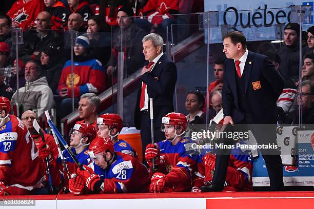 Head coach Valeri Bragin of Team Russia stands on the boards during the 2017 IIHF World Junior Championship bronze medal game against Team Sweden at...