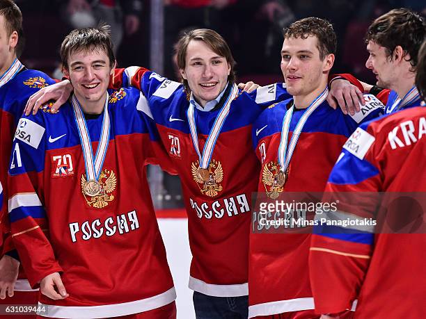Members of Team Russia celebrate their victory during the 2017 IIHF World Junior Championship bronze medal game against Team Sweden at the Bell...