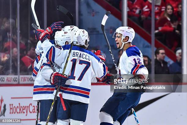 Team United States celebrates a goal in the second period during the 2017 IIHF World Junior Championship gold medal game against Team Canada at the...