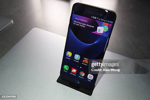 Samsung Galaxy S7 edge smartphone is on display at the Samsung booth during CES 2017 at the Las Vegas Convention Center on January 5, 2017 in Las...