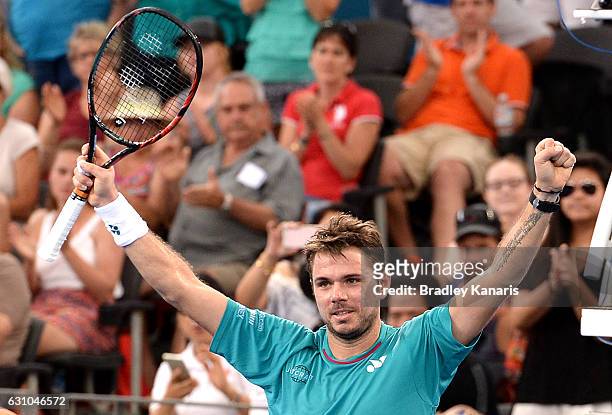 Stan Wawrinka of Switzerland celebrates victory after his match against Kyle Edmund of Great Britain on day six of the 2017 Brisbane International at...