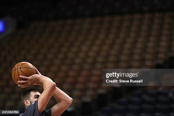 Toronto Raptors center Jonas Valanciunas warms up before the game as the Toronto Raptors beat the Utah Jazz 101-93 at Air Canada Centre in Toronto....