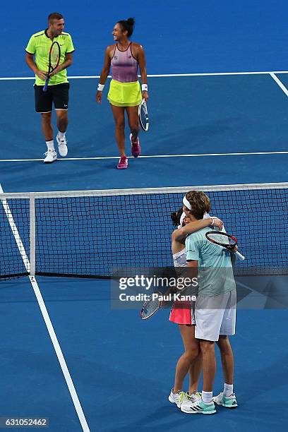 Andrea Petkovic and Alexander Zverev of Germany celebrate winning the mixed doubles match against Heather Watson and Dan Evans of Great Britain...