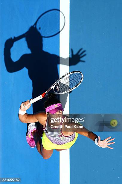 Heather Watson of Great Britain serves to Andrea Petkovic of Germany in the women's singles match during day six of the 2017 Hopman Cup at Perth...