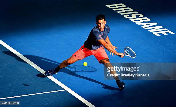 Dominic Thiem of Austria plays a backhand against Grigor Dimitrov of Bulgaria on day six of the 2017 Brisbane International at Pat Rafter Arena on...
