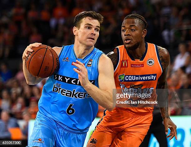 Kirk Penney of the Breakers drives to the basket during the round 14 MNBL match between the Cairns Taipans and the New Zealand Breakers at Cairns...