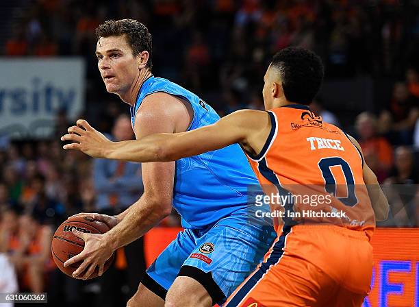 Kirk Penney of the Breakers looks to get past Travis Trice of the Taipans during the round 14 NBL match between the Cairns Taipans and the New...