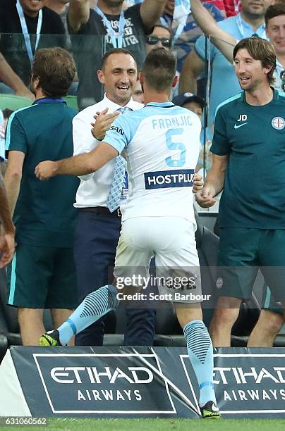 Ivan Franjic of City FC celebrates after scoring the first goal with City FC interim coach Michael Valkanis during the round 14 A-League match...