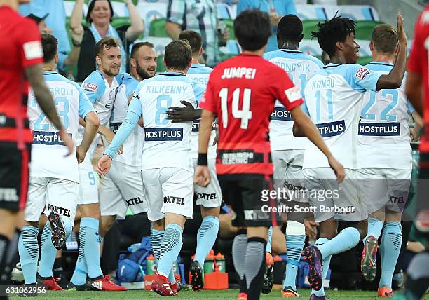Ivan Franjic of City FC celebrates with his teammates after scoring the first goal during the round 14 A-League match between Melbourne City FC and...