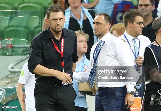 City FC interim coach Michael Valkanis shakes hands with Wanderers coach Tony Popovic after the round 14 A-League match between Melbourne City FC and...