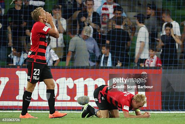Lachlan Scott and Mitch Nichols of the Wanderers react after a missed shot on goal during the round 14 A-League match between Melbourne City FC and...