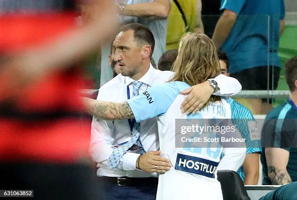 City FC interim coach Michael Valkanis celebrates with Luke Brattan of City FC after the round 14 A-League match between Melbourne City FC and the...