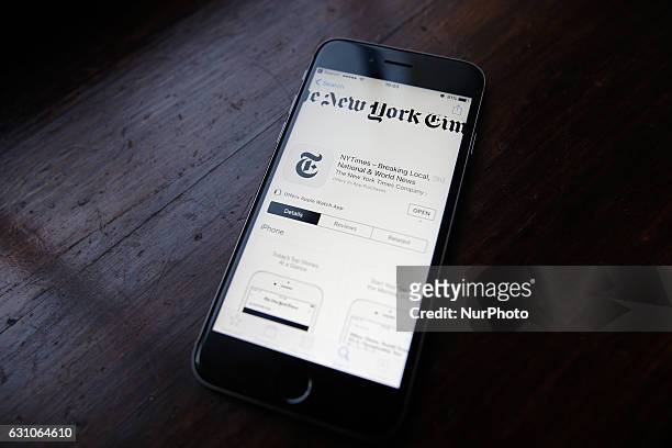 The online version of the New York Times in Chinese language is seen on a mobile phone in Bydgoszcz, Poland on 7 January, 2017.