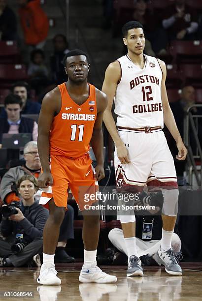 Syracuse University Orange guard Adrian Autry and Boston College center Johncarlos Reyes take the court during an ACC match up between the Boston...