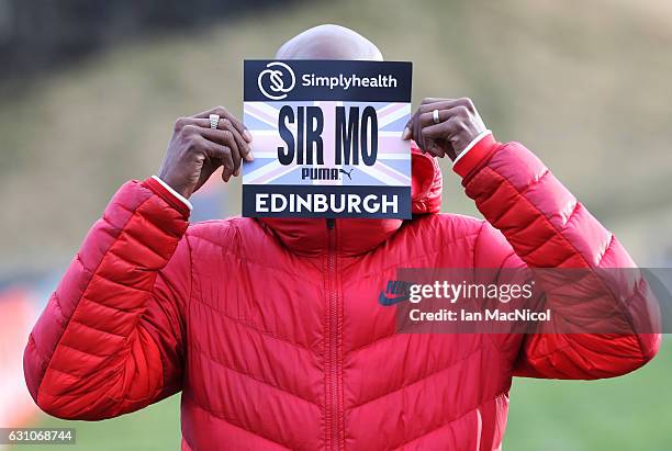 Sir Mo Farah poses for photographs in Holyrood Park prior to tomorrow's Great Edinburgh X Country on January 6, 2017 in Edinburgh, Scotland.
