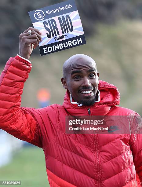 Sir Mo Farah poses for photographs in Holyrood Park prior to tomorrow's Great Edinburgh X Country on January 6, 2017 in Edinburgh, Scotland.