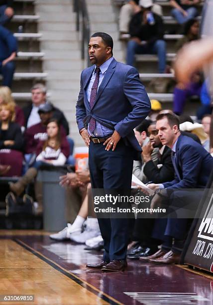 Arkansas Little Rock Trojans head coach Wes Flanigan looks on during an NCAA basketball game between the University of Louisiana at Lafayette Ragin'...