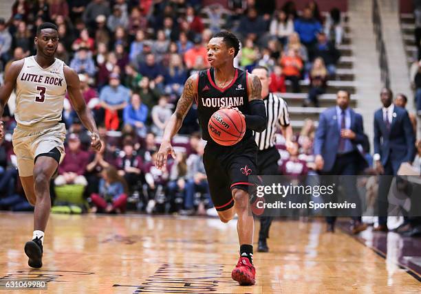 Louisiana Lafayette Ragin Cajuns guard Jay Wright looks to pass during an NCAA basketball game between the University of Louisiana at Lafayette...