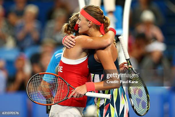 Kristina Mladenovic of France hugs Belinda Bencic of Switzerland after winning the women's singles match during day six of the 2017 Hopman Cup at...