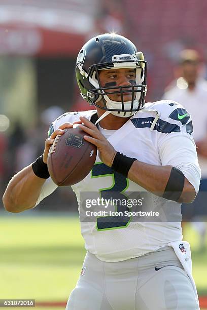 Russell Wilson of the Seahawks warms up before the NFL Game between the Seattle Seahawks and Tampa Bay Buccaneers on November 27 at Raymond James...