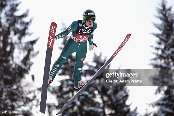 Jurij Tepes of Slovenia competes at the trail round on Day 2 of the 65th Four Hills Tournament ski jumping event at Paul-Ausserleitner-Schanze on...