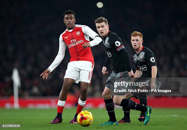 Arsenal's Alex Iwobi and Southampton's Steven Davis and Harrison Reed