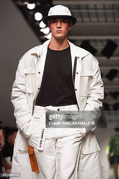 Model presents a creation by British designer Liam Hodges on the first day of the Autumn/Winter 2017 London Fashion Week Men's fashion event in...