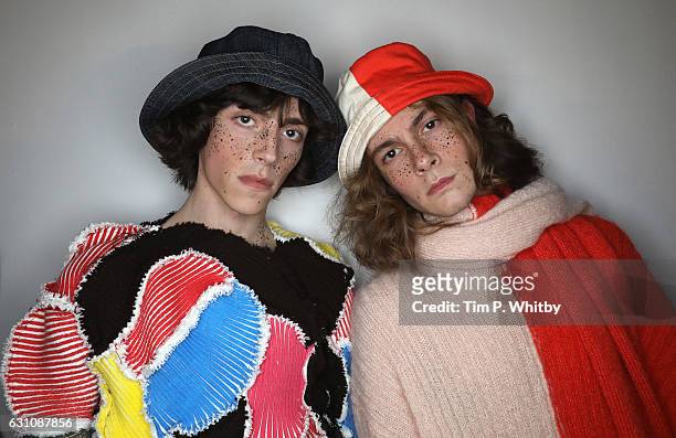 Models backstage ahead of the Alex Mullins show during London Fashion Week Men's January 2017 collections at BFC Backstage Space on January 6, 2017...