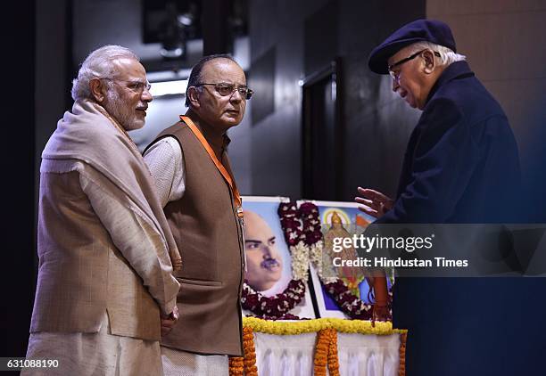 Narendra Modi , Arun Jaitley and LK Advani during the National Office Bearers Meeting at NDMC Convention Centre on January 6, 2017 in New Delhi,...