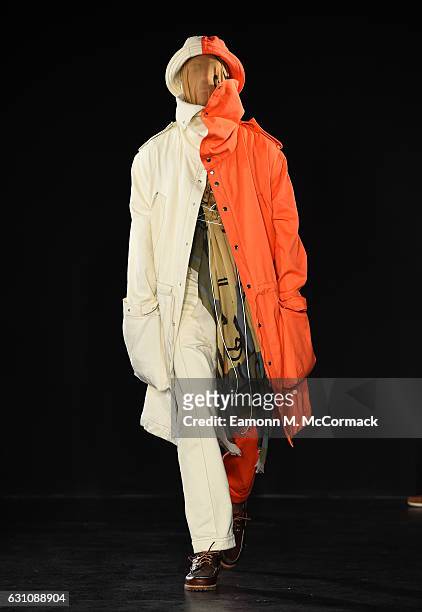 Model walks the runway at the Alex Mullins show during London Fashion Week Men's January 2017 collections at BFC Presentation Space on January 6,...
