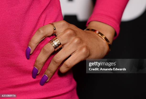 Actress Teala Dunn, jewelry detail, arrives at the premiere of Open Road Films' "Sleepless" at the Regal LA Live Stadium 14 on January 5, 2017 in Los...