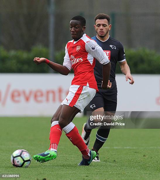 Joseph Olowu of Arsenal under pressure from Mason Bennett of Derby during the match between Arsenal U23 and Derby County U23 at London Colney on...