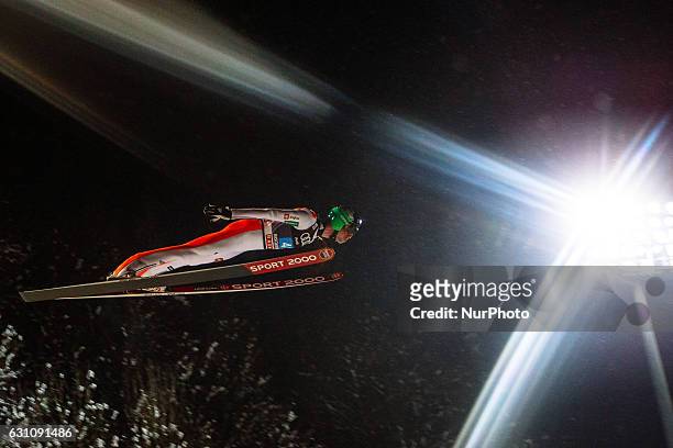 Anze Semenic of Slovenia soars through the air during his first competition jump on Day 2 on January 6, 2017 in Bischofshofen, Austria.