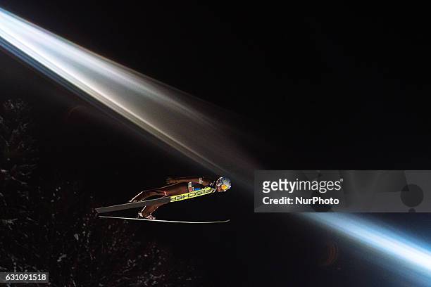 Kamil Stoch of Poland soars through the air during his first competition jump on Day 2 on January 6, 2017 in Bischofshofen, Austria.