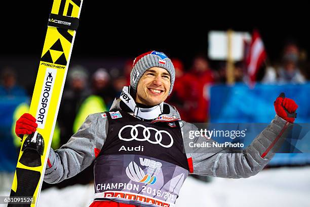 Kamil Stoch of Poland celebrates victory after the final round on Day 2 of the 65th Four Hills Tournament ski jumping event at...