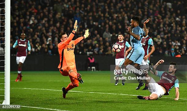 Havard Nordtveit of West Ham United scores an own goal which after he is put under pressure from Raheem Sterling of Manchester City during The...