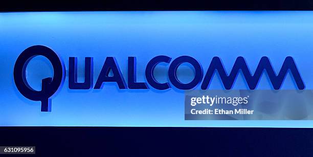 Qualcomm sign is shown on stage before a keynote address by Qualcomm Inc. CEO Steve Mollenkopf at CES 2017 at The Venetian Las Vegas on January 6,...