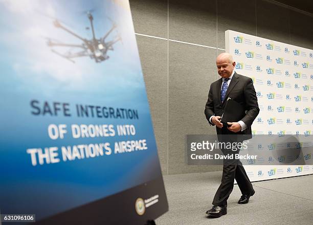 Administrator Michael Huerta exits the stage after speaking at a news conference at CES 2017 at the Las Vegas Convention Center on January 6, 2017 in...