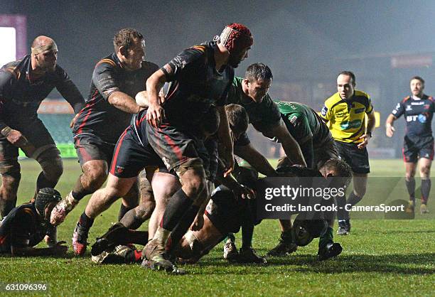 Newport Gwent Dragons' Lewis Evans scores his sides second try during the Guinness PRO12 Round 13 match between Newport Gwent Dragons and Benetton...