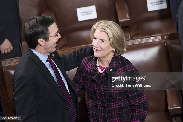 Rep. Evan Jenkins, R-W.Va., and Sen. Shelley Moore Capito, R-W.Va., talk in the House chamber before a joint session of Congress to tally the...