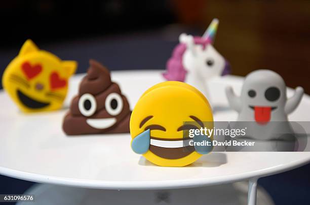 Batteries designed as emojis are displayed at the Philo booth at CES 2017 at the Las Vegas Convention Center on January 6, 2017 in Las Vegas, Nevada....