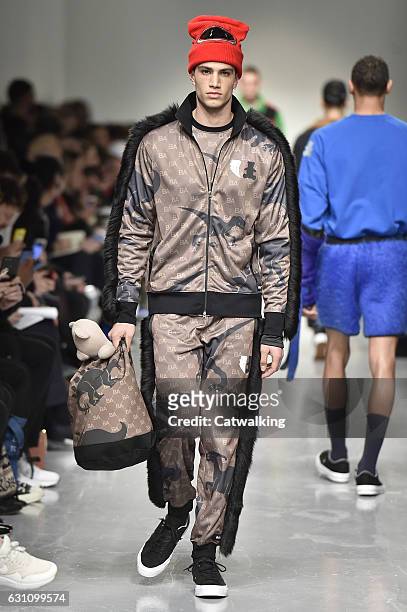 Model walks the runway at the Bobby Abley Autumn Winter 2017 fashion show during London Menswear Fashion Week on January 6, 2017 in London, United...