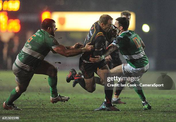 Newport Gwent Dragons' Sarel Pretorius looks for a way through during the Guinness PRO12 Round 13 match between Newport Gwent Dragons and Benetton...