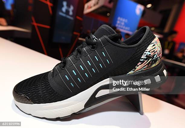 An Under Armour SpeedForm Europa Record-Equipped running shoe is displayed at CES 2017 at the Sands Expo and Convention Center on January 6, 2017 in...