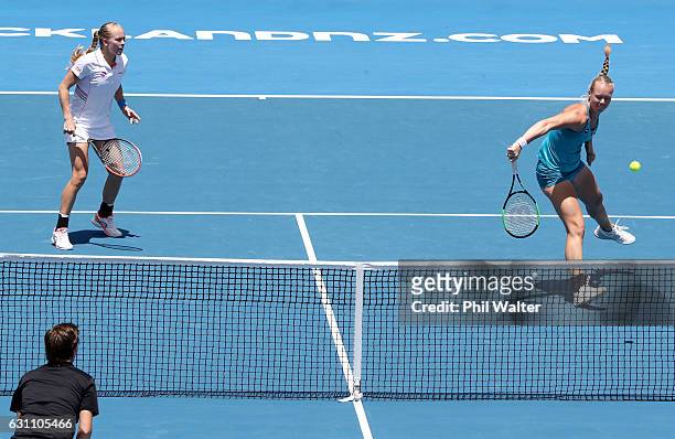 Kiki Bertens of the Netherlands and Johanna Larsson of Sweden play a return during the womens doubles final against Demi Schuurs of the Netherlands...