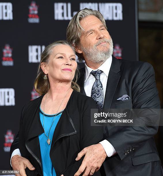 Actor Jeff Bridges stands with his wife Susan Geston during his Hand and Footprint Ceremony at the TCL Chinese Theater in Hollywood, California, on...