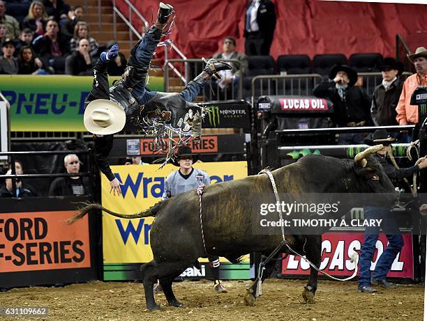 Professional Bull Riders rider Tyler Harron Kookaburra is flipped off a bull during the Built Ford Tough Series Monster Energy Buck Off at Madison...