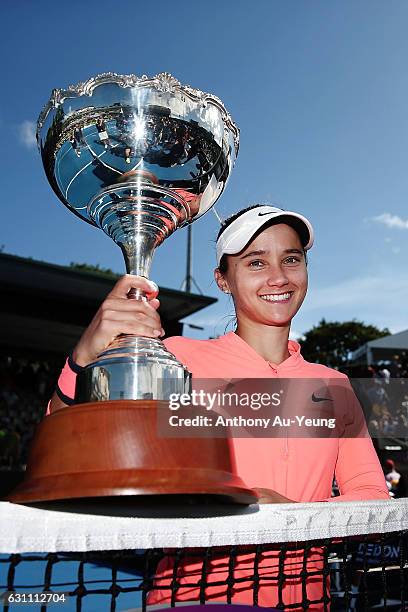 Lauren Davis of USA poses with the trophy after winning her final match against Ana Konjuh of Croatia on day six of the ASB Classic on January 7,...