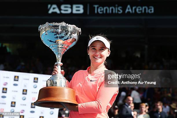 Lauren Davis of USA poses with the trophy after winning her final match against Ana Konjuh of Croatia on day six of the ASB Classic on January 7,...